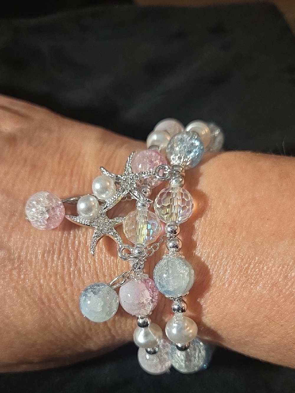 2 - Silver Starfish Charm Bracelets with Pink Beads and Light Blue Beads.